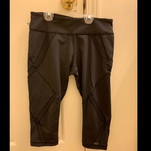 Black cropped lulu leggings with mesh insert